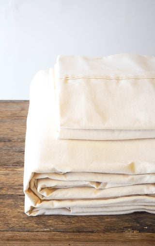 Do You Really Need a Top Sheet? 6 Experts Weigh In
