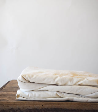This Is Exactly How to Fold a Fitted Sheet (Without Getting Tangled) - Hemp Gallery